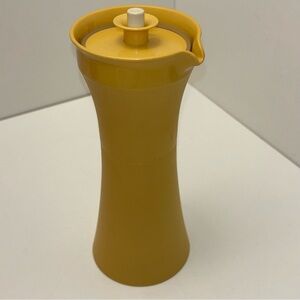 Tupperware vinegar or oil cruet in harvest gold